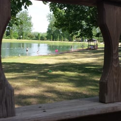 Niagara County Camping Resort - View of the swimming pond from the playground.