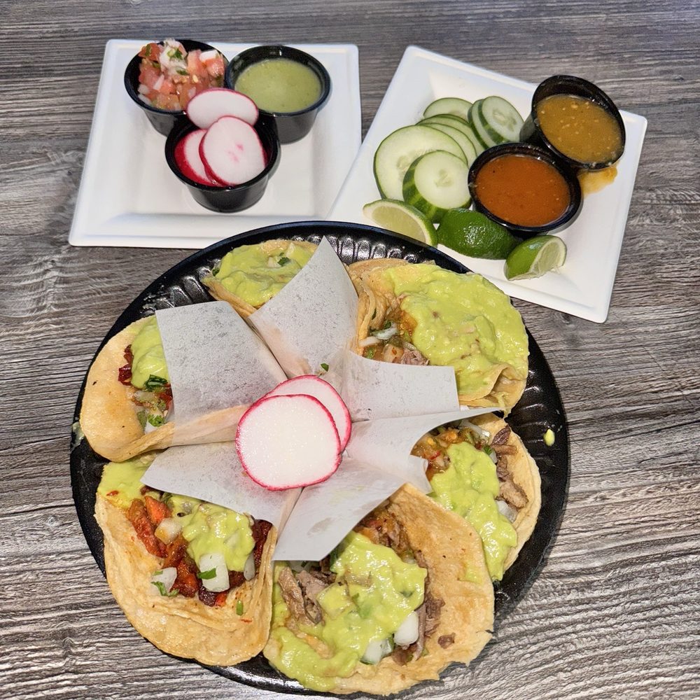 Delicious taco plate. I tried them all. They were all delicious. Combined with the house salsas they were great. Delicious taco plate. I tried them all. They were all delicious. Combined with the house salsas they were great.