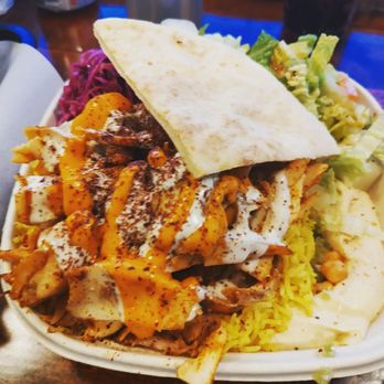 Kamoon Arabian Cuisine - Chicken Shawarma plate with saffron yellow rice, small salad, hummus and pita bread with cabbage and onions. - Arabic Near Me - Missoula, Montana