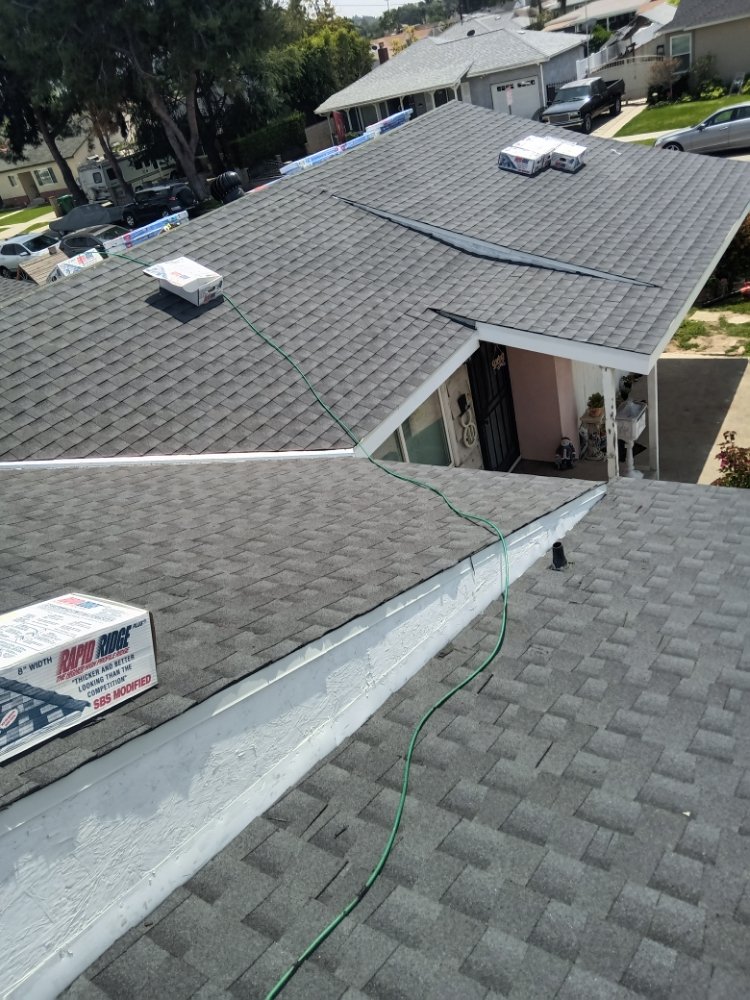 Slide of R & S All American Roofing