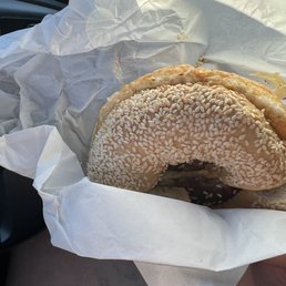 Sesame bagel with local sausage, cheddar and egg.