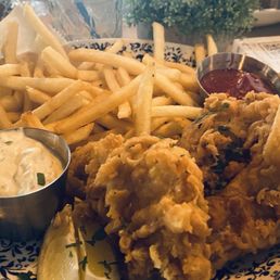 This is fried codfish and french fries This is fried codfish and french fries