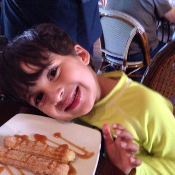 Miguel's Cocina - Luis loving his churros! - Mexican Near Me - Coronado, California Miguel's Cocina - Luis loving his churros! - Mexican Near Me - Coronado, California