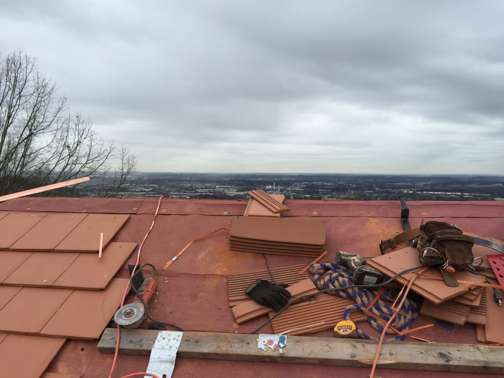 Slide of Capstone Roofing