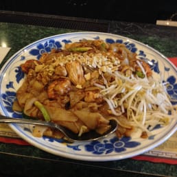 Their version of pad Thai - huge portion size, thick instead of thin noodles, mixed meats, very sweet