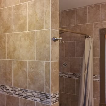 McCoy Construction - a bathroom with a shower, toilet, and sink - General Contractors Near Me - Reedsburg, Wisconsin McCoy Construction - a bathroom with a shower, toilet, and sink - General Contractors Near Me - Reedsburg, Wisconsin