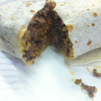 Sergio's Tacos - Carne asada burrito and it comes with cheese and red chili - Mexican Near Me - Commerce, California
