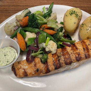Bavarian Grill - Grilled salmon with vegetable medley and boiled potatoes, chive butter on the side - German Near Me - Plano, Texas Bavarian Grill - Grilled salmon with vegetable medley and boiled potatoes, chive butter on the side - German Near Me - Plano, Texas