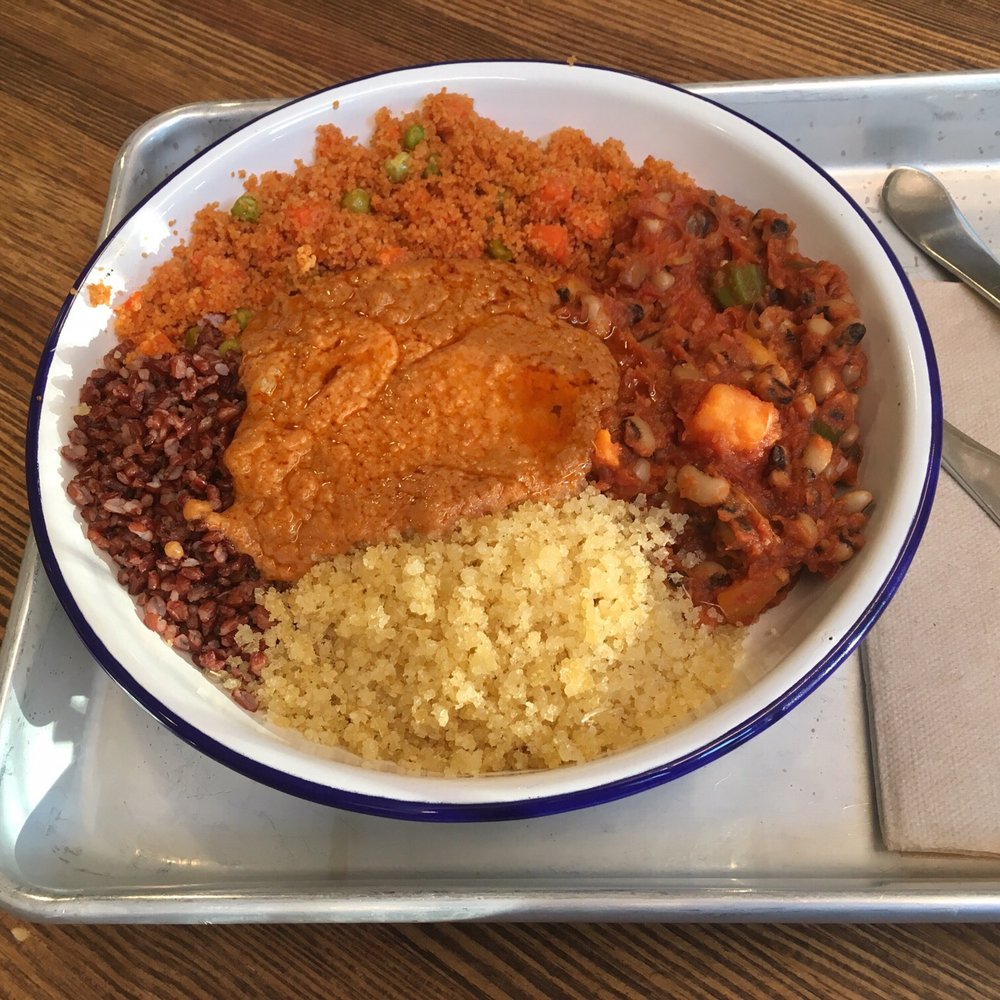 Teranga Harlem - Ndambe with jollof fonio, attieke, and Liberian "ruby" red rice with mafe sauce. - African Near Me - New York, New York Teranga Harlem - Ndambe with jollof fonio, attieke, and Liberian "ruby" red rice with mafe sauce. - African Near Me - New York, New York