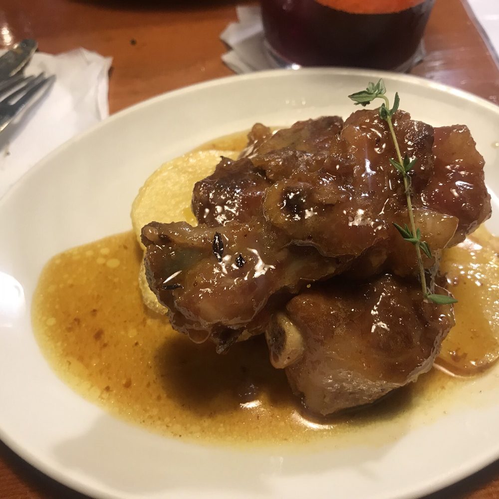Eslava - Costilla de cerdo con miel de romero al horno- Roasted pork ribs with rosemary honey glaze - Tapas Bars Near Me - Seville, SE Eslava - Costilla de cerdo con miel de romero al horno- Roasted pork ribs with rosemary honey glaze - Tapas Bars Near Me - Seville, SE