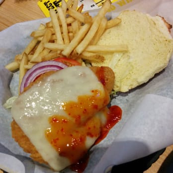 Buffalo Wild Wings - Fried chicken sandwich and fries came out slightly cold...barely any sauce on it either.... - Chicken Wings Near Me - Ballwin, Missouri Buffalo Wild Wings - Fried chicken sandwich and fries came out slightly cold...barely any sauce on it either.... - Chicken Wings Near Me - Ballwin, Missouri
