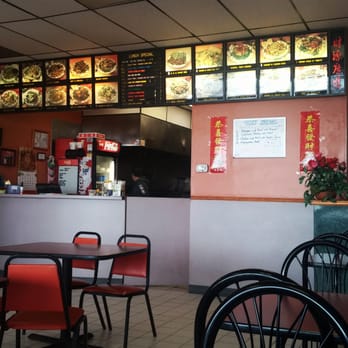 En Lai Restaurant - tables and chairs in a restaurant - Chinese Near Me - Midlothian, Illinois