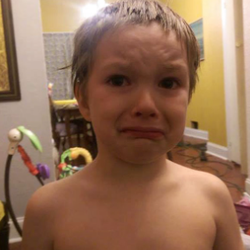 Greenway School - Liam after i gave him a bath yet he still has his tooth gone and hes refusing to smile and finally smiled after 3 weeks