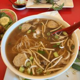 Rare steak, beef, tendon, tripe and meatball pho noodle soup Rare steak, beef, tendon, tripe and meatball pho noodle soup