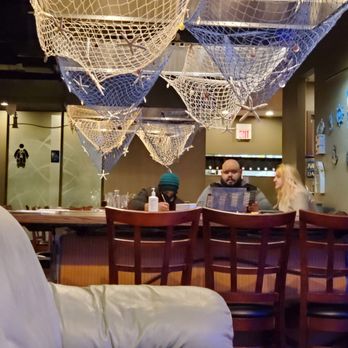 Honkaku Sushi - a man and a woman sitting at a bar - Sushi Bars Near Me - Glendale Heights, Illinois Honkaku Sushi - a man and a woman sitting at a bar - Sushi Bars Near Me - Glendale Heights, Illinois