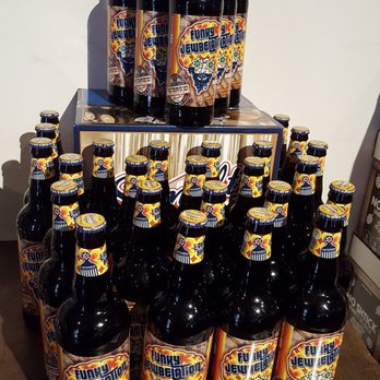 Shmaltz Brewing Company - a stack of beer bottles - Breweries Near Me