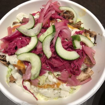 INDAY - Charred chicken with layer of rice and lettuce. Pickled cabbage and cucumber topping. - Indian Near Me - New York, New York INDAY - Charred chicken with layer of rice and lettuce. Pickled cabbage and cucumber topping. - Indian Near Me - New York, New York