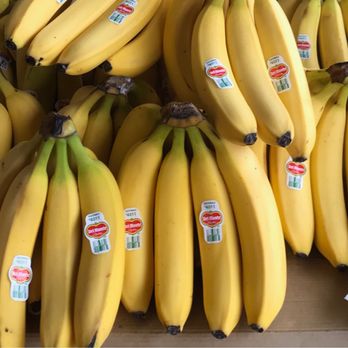 Chong Long Market - bunches of bananas on display - Fruits & Veggies Near Me - Oakland, California Chong Long Market - bunches of bananas on display - Fruits & Veggies Near Me - Oakland, California
