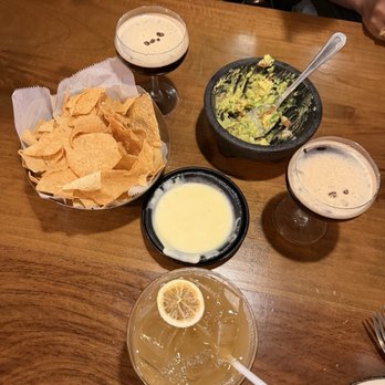La Parrilla Mexican Restaurant - Queso and chips with guacamole and drinks - Mexican Near Me - Norcross, Georgia La Parrilla Mexican Restaurant - Queso and chips with guacamole and drinks - Mexican Near Me - Norcross, Georgia