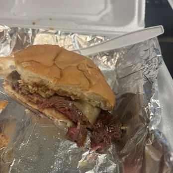 Badger Tavern - Half of the ribeye sandwich with pepper jack added. - Sports Bars Near Me - Madison, Wisconsin