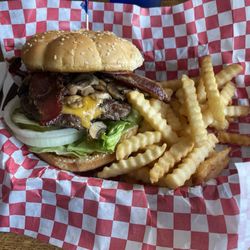 Bacon, Mushroom and cheese hamburger and fries.