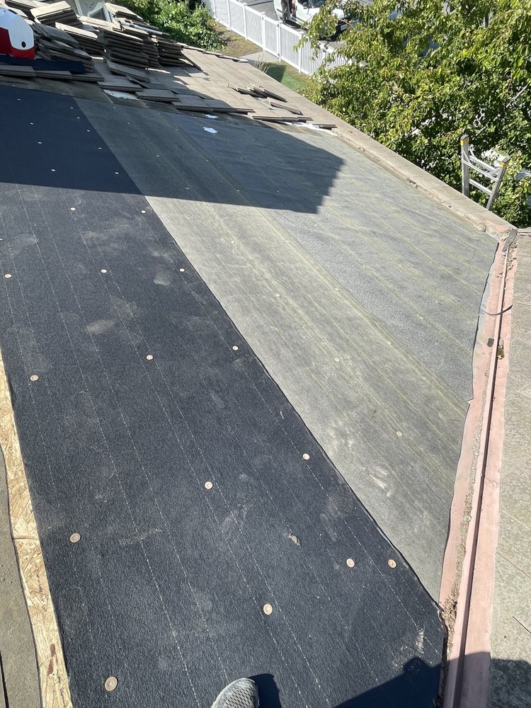 Slide of Global Elite Roofing