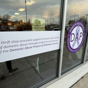 Thrift & Thrive - Storefront window with sign that states that all proceeds support the Domestic Abuse Project of Delaware County - Thrift Stores Near Me - Drexel Hill, Pennsylvania