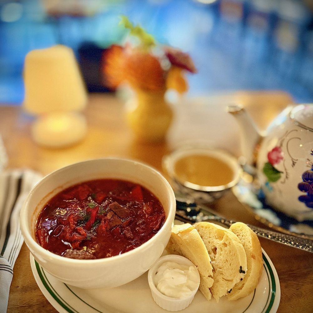 UMA’S - BORSCHT Soup: A Ukrainian classic with beef, beets, cabbage, potatoes, and carrots, served with sour cream. - Uzbek Near Me - San Luis Obispo, California UMA’S - BORSCHT Soup: A Ukrainian classic with beef, beets, cabbage, potatoes, and carrots, served with sour cream. - Uzbek Near Me - San Luis Obispo, California