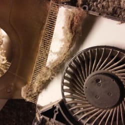 The Computer Repair King - Another view with the lint pulled away freeing the air vent for proper heat exhaust and airflow to keep this laptop running c...