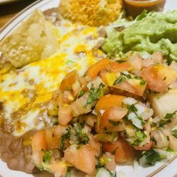 La Capilla Mexican Restaurant - Rice, beans, guacamole, etc., as sides for the fajitas.
