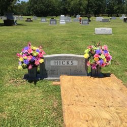 Tri City Florist - Beautiful bouquets for the vases in the headstone