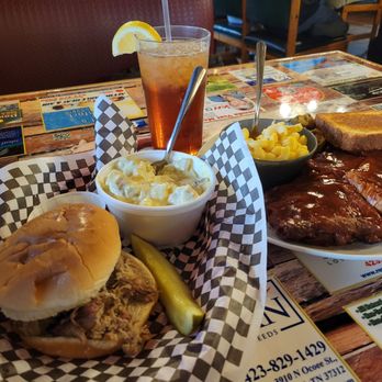 Jordan's Bar-B-Q - Pulled Pork Sandwich with Potato Salad $8, and Baby Back Ribs Plate with Fried Okra and Man N Cheese $19. - Barbeque Near Me - Cleveland, Tennessee