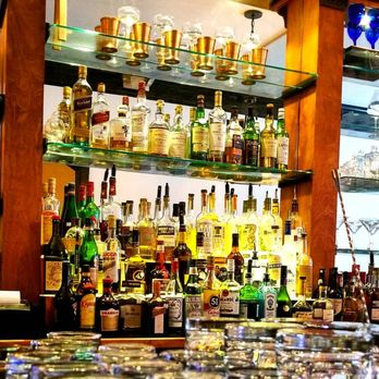 The Stables - a bar with many bottles of alcohol - New American Near Me - Richmond, Virginia