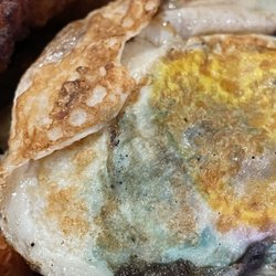 The Hideaway - Ordered the schnitzel and the egg looked like this -- why is it green?