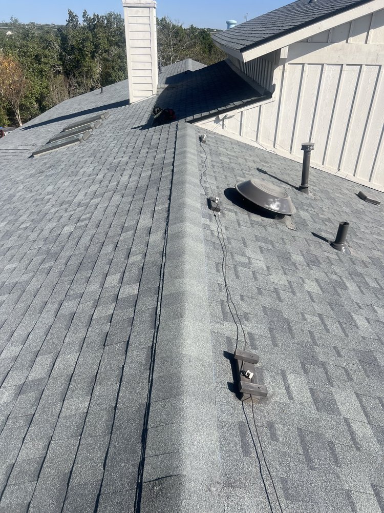 Slide of Stallion Roofing Company