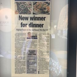 Taj Kabob - Afghan Street Food - A review on their wall.