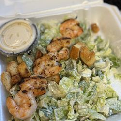 Isaac Newton's Fun Food & Drink - Caesar salad with shrimp skewers and the extra dressing