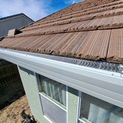 Rain Runner Gutters - White Seamless Gutter installed in roseville