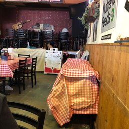 a restaurant with tables and chairs a restaurant with tables and chairs