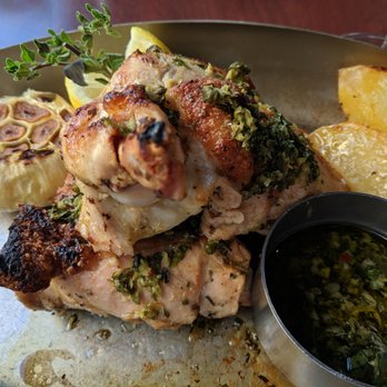 Ouzo Bay - Roast chicken w lemon potatoes, herb sauce, and roasted garlic - Greek Near Me - Baltimore, Maryland Ouzo Bay - Roast chicken w lemon potatoes, herb sauce, and roasted garlic - Greek Near Me - Baltimore, Maryland