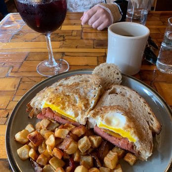 The Treehouse - Bologna sandwich, sangria and coffee - served during weekend brunch - New American Near Me - Nashville, Tennessee The Treehouse - Bologna sandwich, sangria and coffee - served during weekend brunch - New American Near Me - Nashville, Tennessee