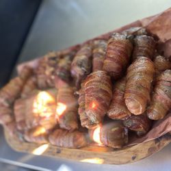 Sosa’s Barbecue - Armadillo eggs (jalapeño stuffed with cream cheese and brisket wrapped in three pieces of bacon.