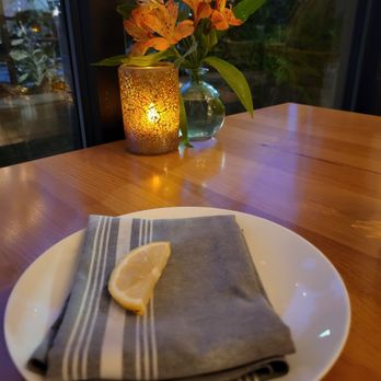 Charcoal - "oshibori" with lemon slice for sticky fingers after wings and burger and fries. - New American Near Me - Edmonds, Washington Charcoal - "oshibori" with lemon slice for sticky fingers after wings and burger and fries. - New American Near Me - Edmonds, Washington