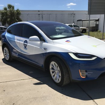 Now That's A Wrap - HART Telsa Wrap - Signmaking Near Me - Sarasota, Florida