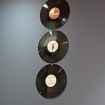 Lucky Pot - three vinyl records mounted on a wall - Chinese Near Me - Toronto, Ontario