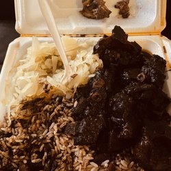 Lighthouse Jamaican Restaurant - They have done it again this platter of oxtails and cabbage was fantastic. The cabbage had peas carrot and corn in it, it was good yummmmm