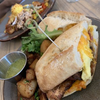 The Garden Table - Breakfast Sammie Sandwich This dish comes with potatoes and the a dipping sauce which is in on the side. The sauce is really good. - Breakfast & Brunch Near Me - Indianapolis, Indiana