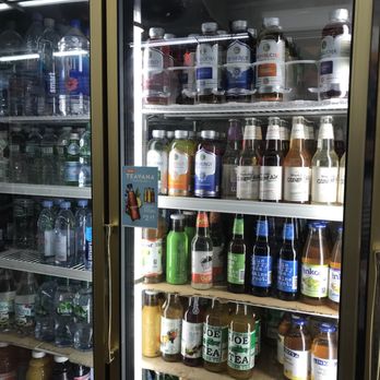 Pal Supermarket - a refrigerator full of drinks and condiments - Convenience Stores Near Me - Brooklyn, New York