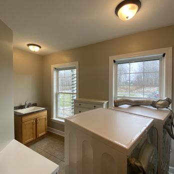 Joseph Rivers Painting - a laundry room with a washer and dryer - Painters Near Me - Homer, New York Joseph Rivers Painting - a laundry room with a washer and dryer - Painters Near Me - Homer, New York