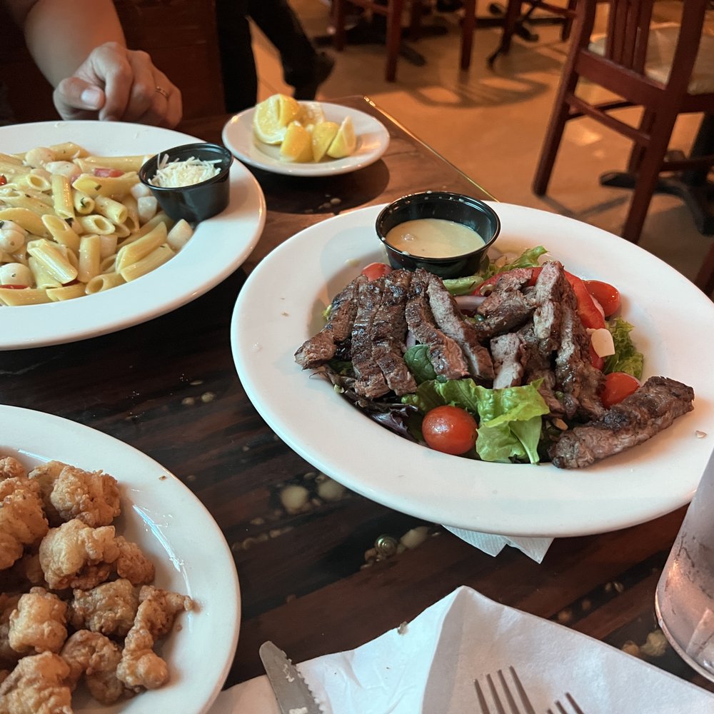 Northwest Grille - Peppercorn steak salad, scallops provencal pasta, wild caught florida alligator tail - Seafood Near Me - Gainesville, Florida